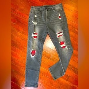 Distressed jeans with red and black flannel
